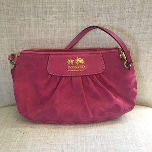 Pink Coach wristlet w/ gold accents 👛